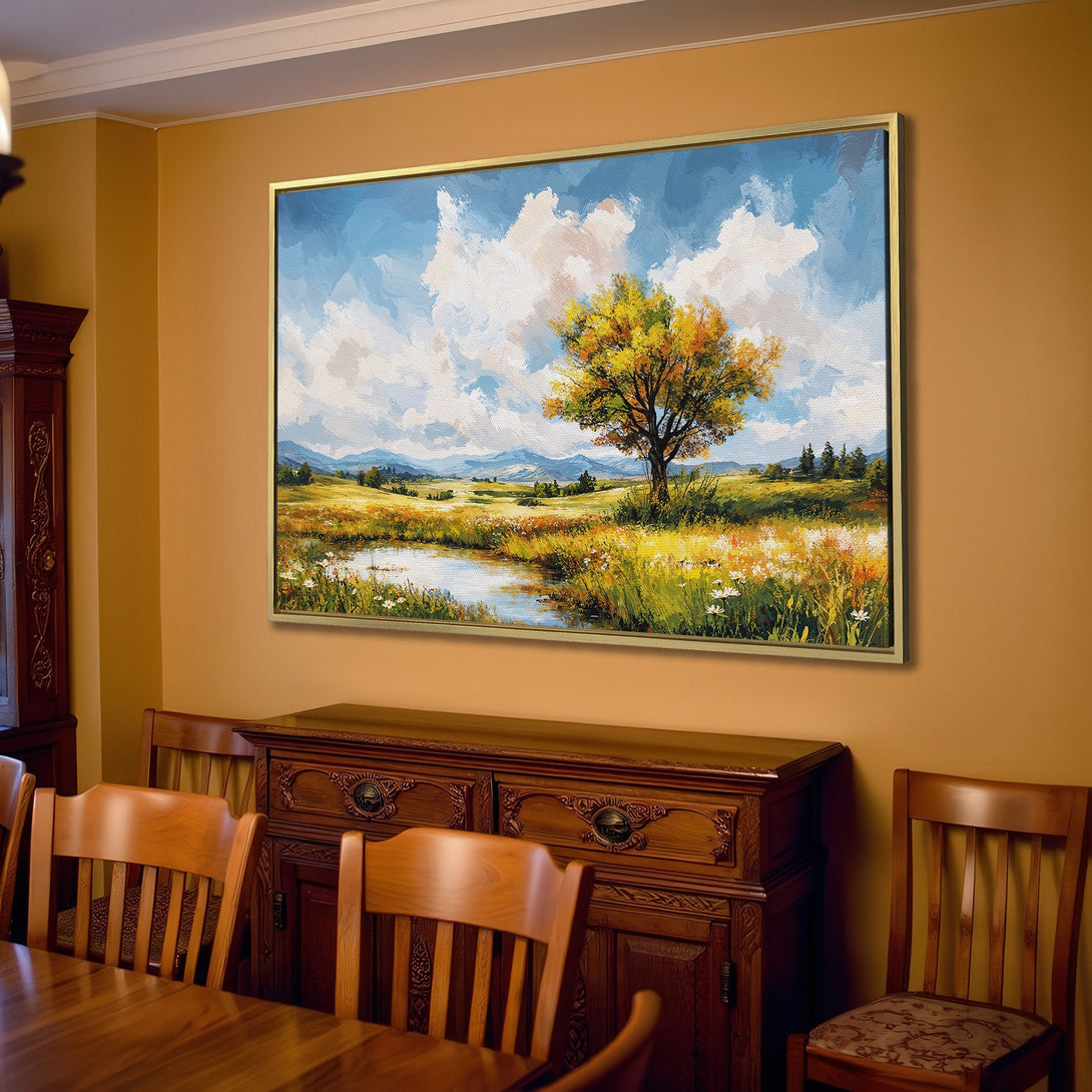 Canvas Print of a serene landscape painting with a tree, featuring a blue sky and warm color palette. Perfect for living room decor.