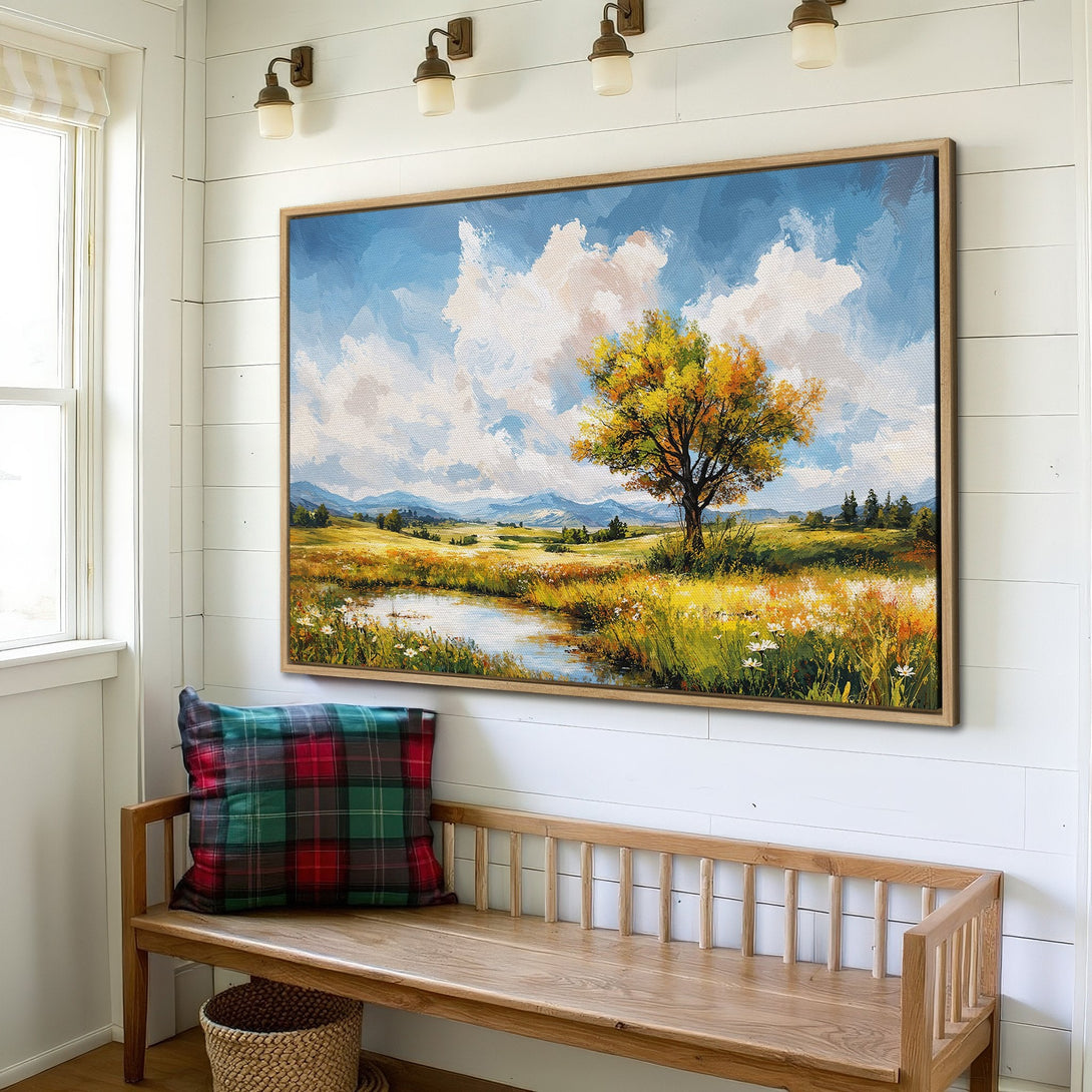 Framed Wall Art: Landscape painting with a tree in a field, featuring a warm color palette of yellows, greens, and blues. Perfect for home decor.