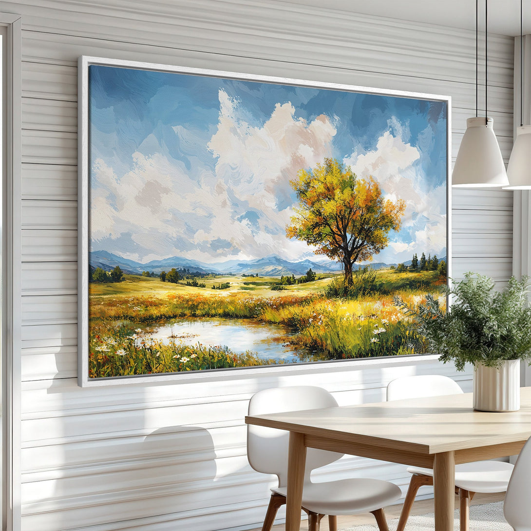 Framed Wall Art: Landscape painting with a tree, blue sky, and yellow/green fields. Impressionistic style, warm color palette, perfect for home decor.