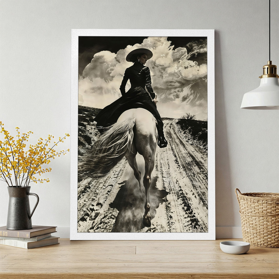 Framed Poster of a cowgirl riding a white horse, artistic monochrome style. Perfect wall art for a rustic aesthetic.