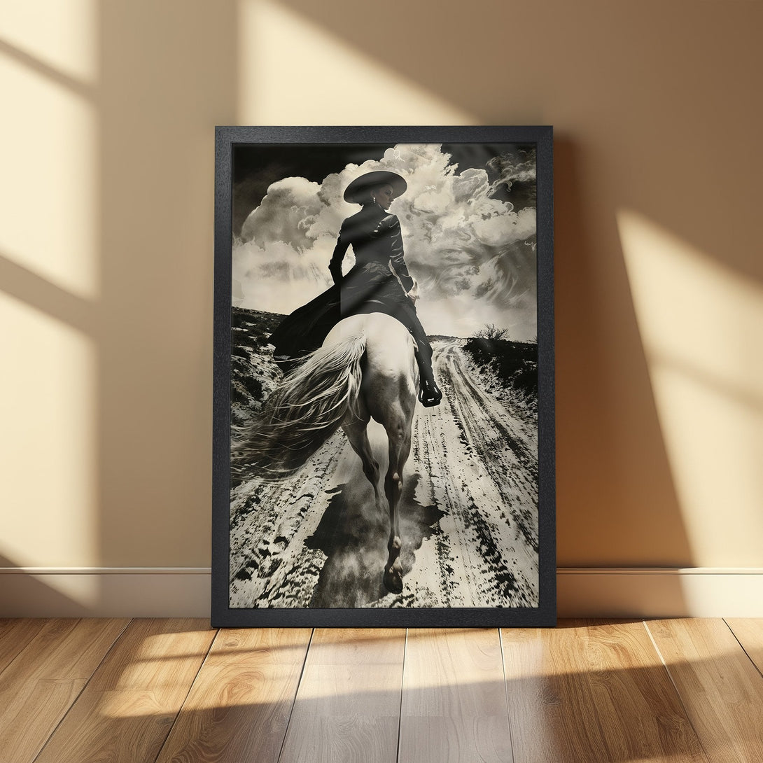 Framed Poster featuring a cowgirl riding a horse in a vintage, monochrome style. A beautiful art piece for your home decor.