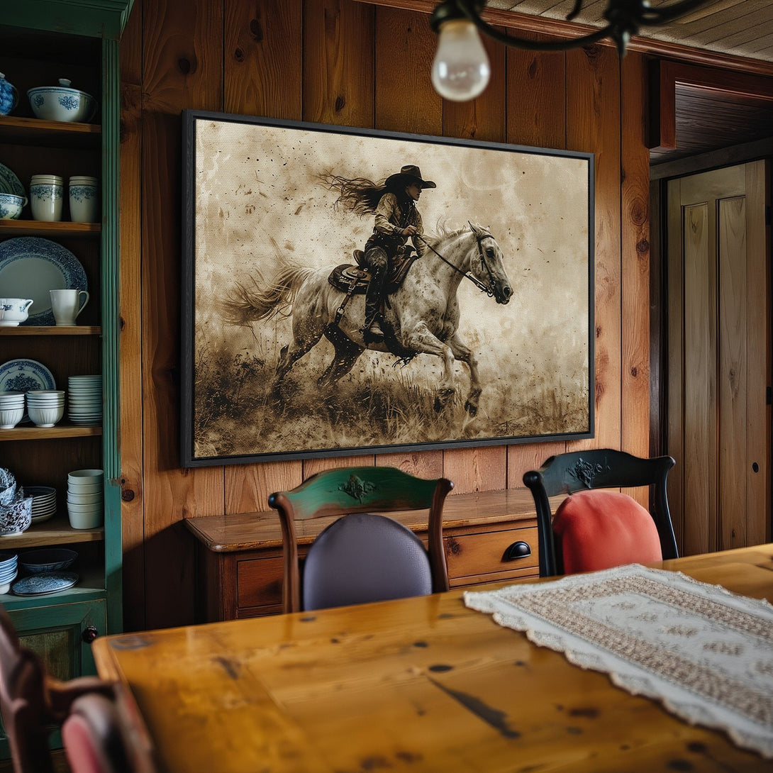 Framed Wall Art: Western-style canvas print of a cowgirl on a horse, sepia tones. Rustic decor for your home.