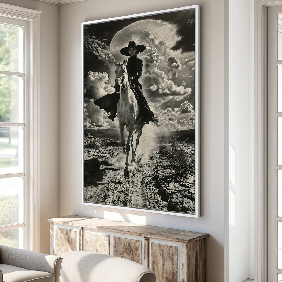 Framed Wall Art: Dramatic black & white photo of a cowgirl on horseback. Western-inspired art for your home. Modern decor with a vintage feel.