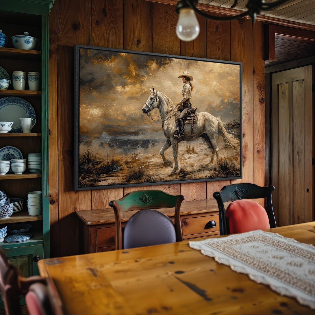 Framed Wall Art: Western-style canvas print of a cowgirl on a white horse, warm color palette, rustic decor. Add a touch of the Wild West!
