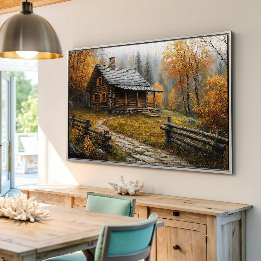 Framed Wall Art of a rustic cabin in autumn, warm color palette. Perfect for cozy home decor.
