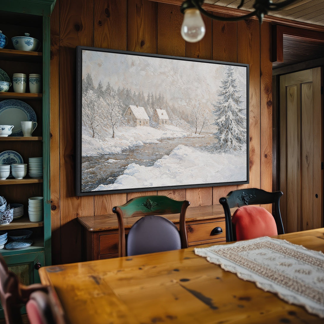Framed Wall Art: Winter landscape canvas print in a cozy interior. Neutral color palette with snow, trees, and a serene river scene. Perfect for home decor.