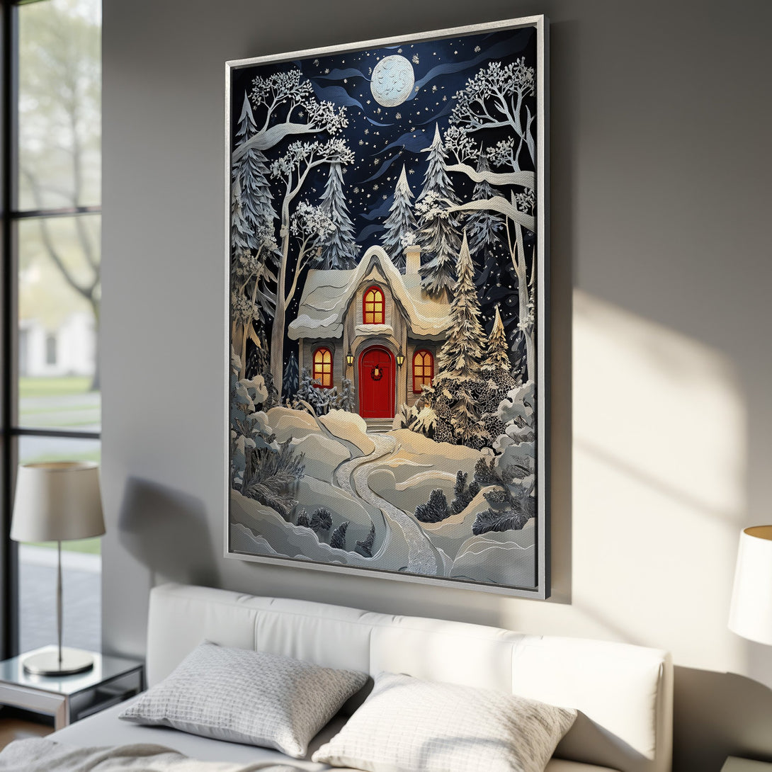 Framed Wall Art featuring a winter cabin scene in a paper-cut style. Blue, white, and red color palette, perfect for cozy decor.