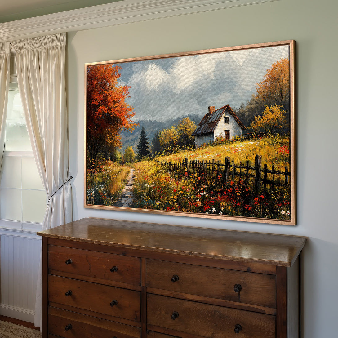 Framed Wall Art: Rustic landscape Canvas Print with warm autumn colors. Features a charming cottage, vibrant foliage, and a calming, natural palette.
