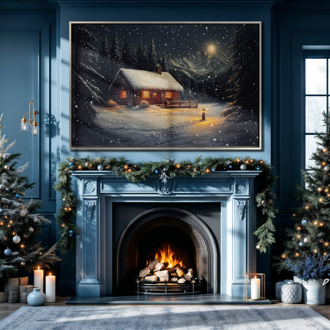 Framed Wall Art: Winter cabin scene in a snowy landscape. Cozy, warm tones in a dark blue interior. Perfect for holiday decor.