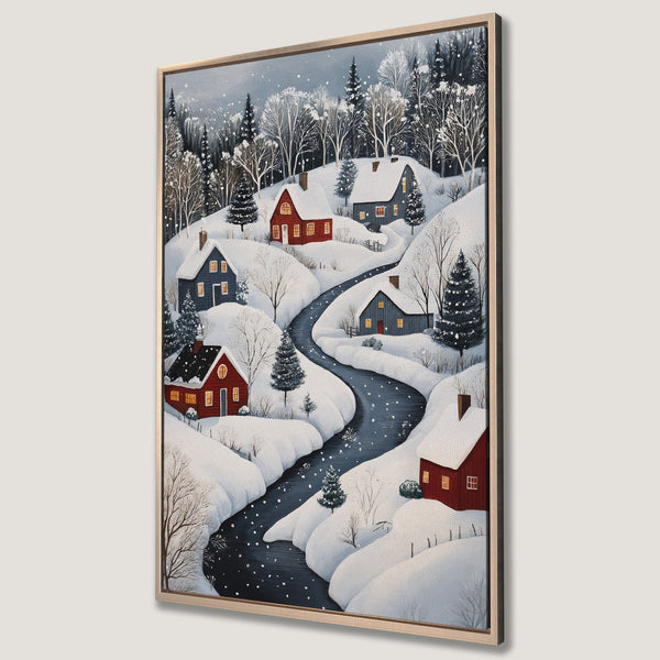 Framed Wall Art Canvas Print of a winter village scene. Cozy folk art style with red houses, snowy landscape, and a cool blue and white color palette. Perfect for holiday decor.