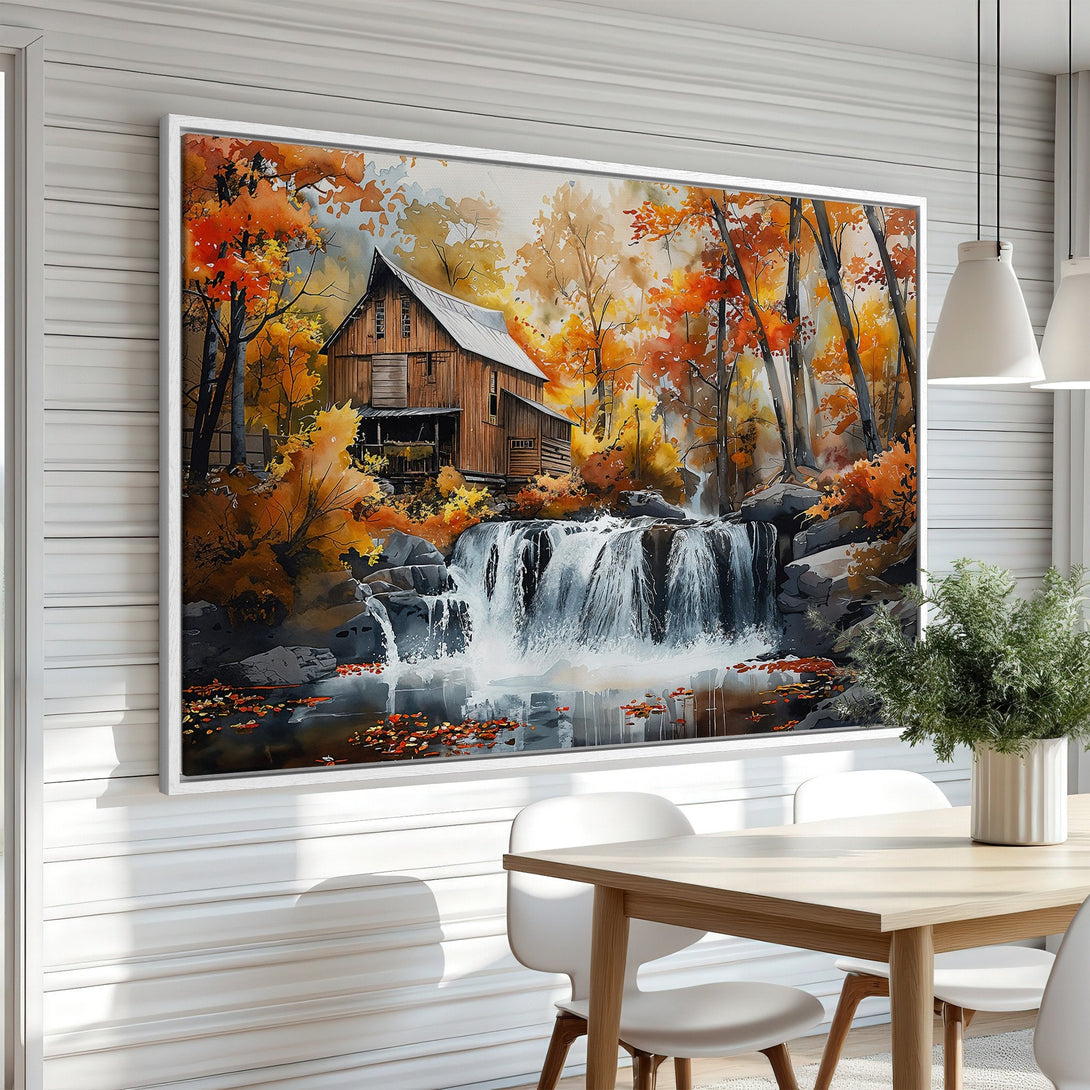 Framed Wall Art: Watercolor painting of a waterfall and barn in autumn colors. Warm orange, yellow, and brown tones create a cozy, rustic vibe.