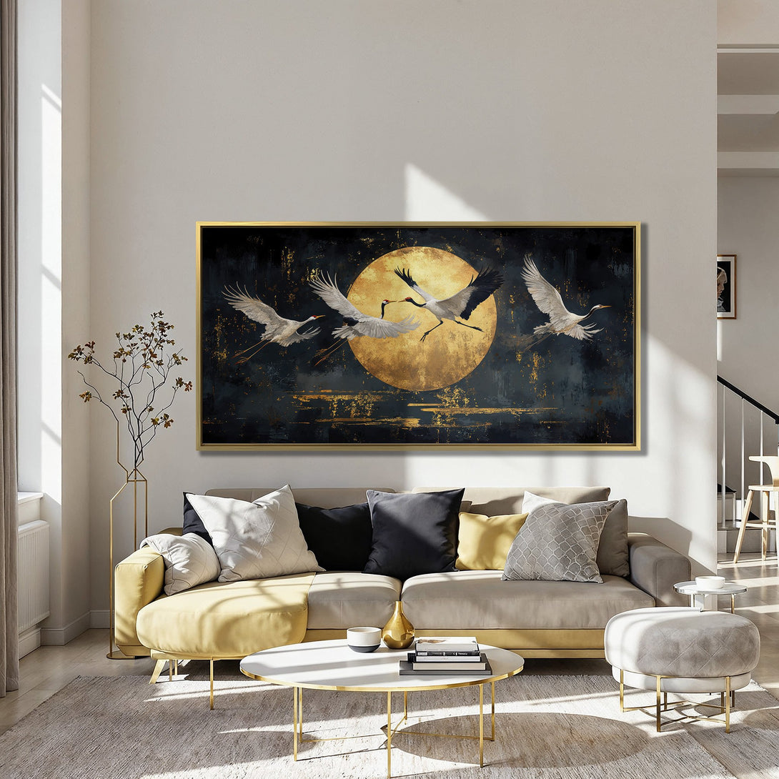 Canvas Print of cranes flying in front of a golden moon.  Dramatic artwork with a dark, moody palette and elegant style.