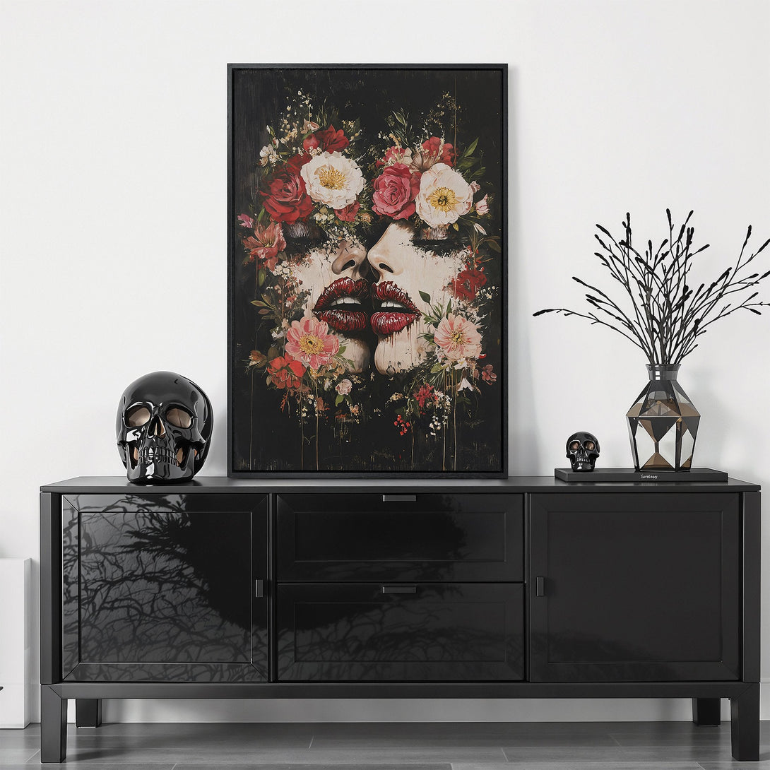 Framed Wall Art featuring a surreal portrait with floral accents, in a dark, moody color palette of black, red, and white. Elevate your space with this unique piece!