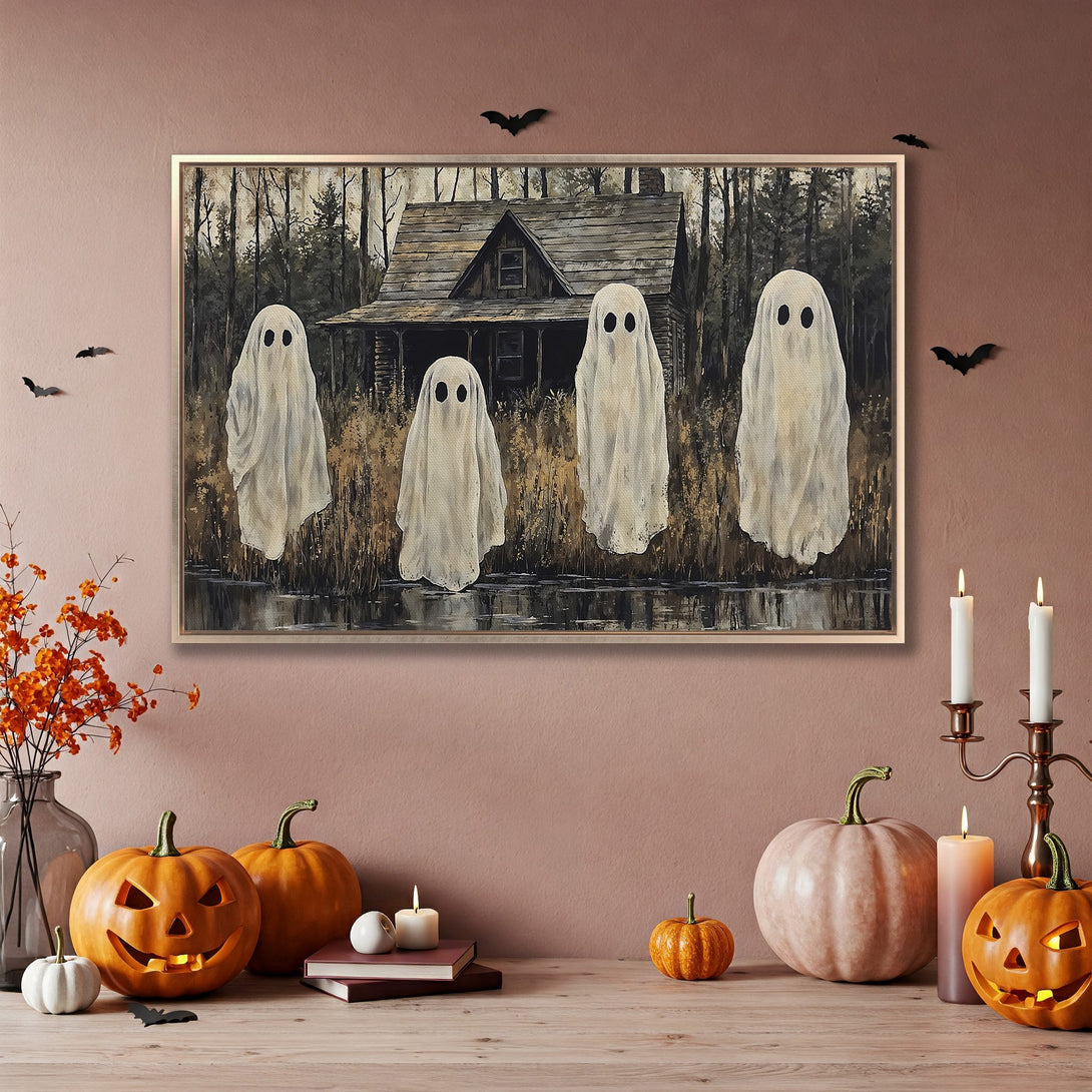 Framed Wall Art featuring spooky ghosts in a forest scene. Perfect Halloween decor! Neutral color palette with a touch of orange.