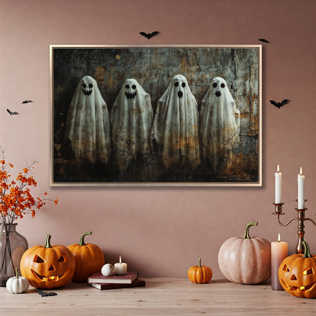 Framed Wall Art: Spooky Halloween ghosts with a vintage, textured style in a muted color palette. Perfect for adding a touch of frightful decor!