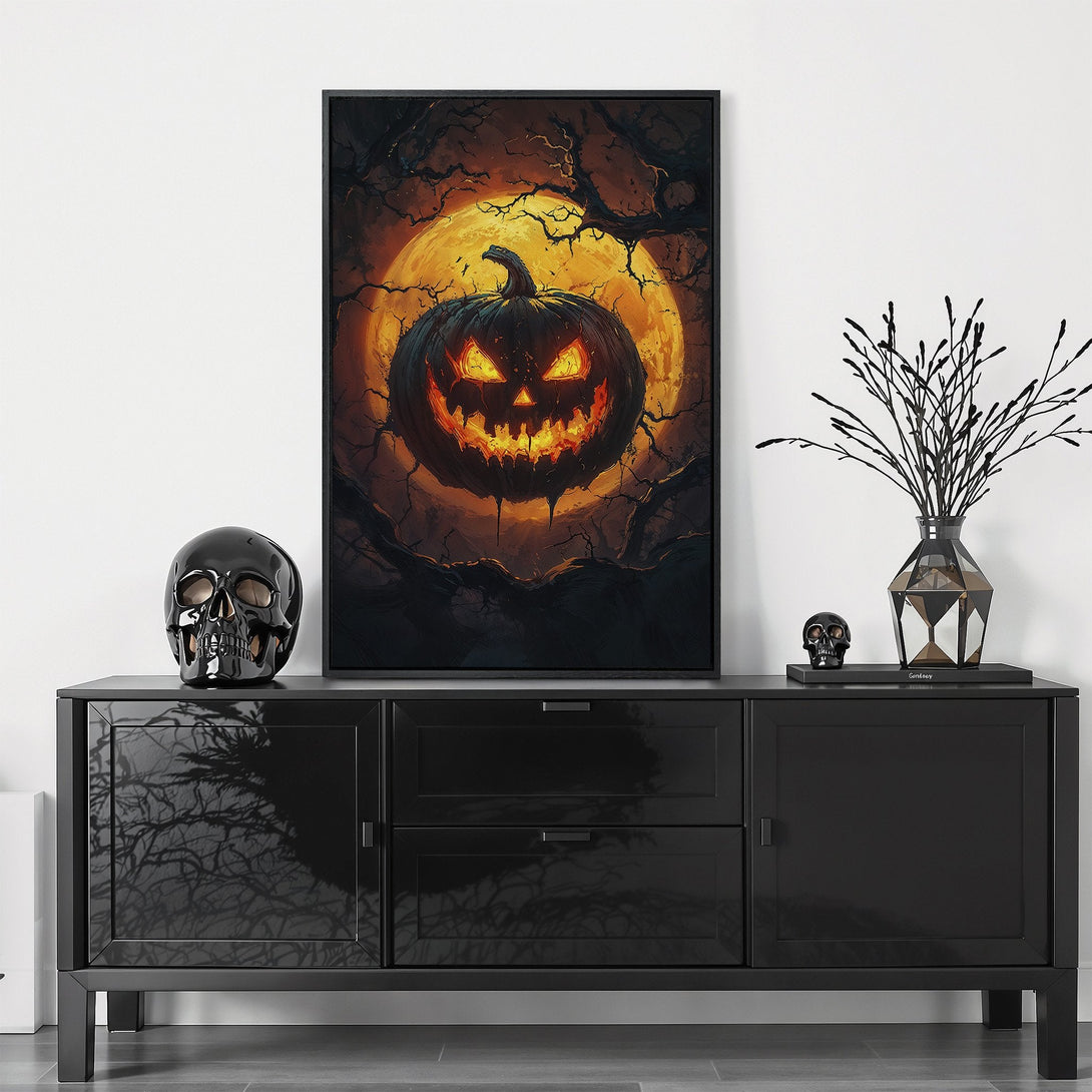 Framed Wall Art featuring a spooky pumpkin against a glowing moon. Dark, moody artwork with orange and black color palette, perfect for Halloween decor.
