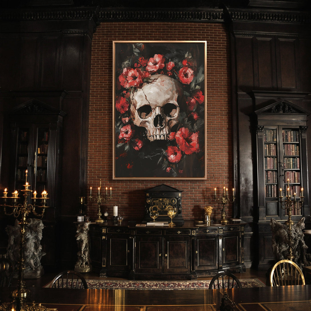 Framed Wall Art: Skull with red flowers. Gothic style Canvas Print in dark interior, featuring a dramatic black, red, and white color palette.