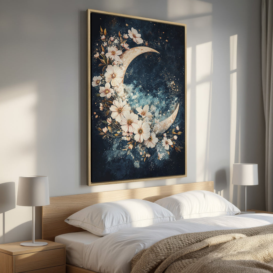 Framed Wall Art featuring a celestial moon design with white flowers, set in a bedroom. Dark blue and cream color palette, perfect for adding a touch of elegance.