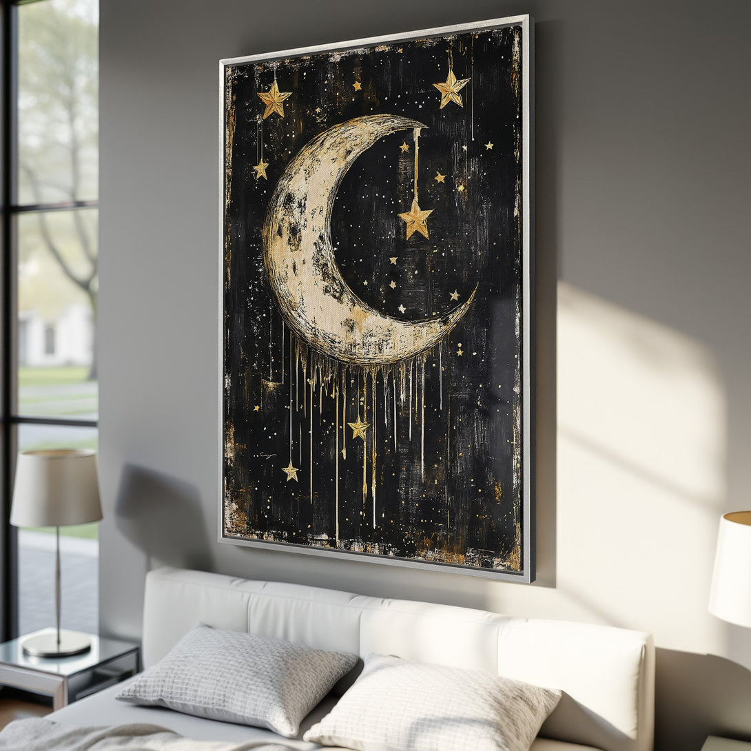 Framed Wall Art featuring a celestial moon and stars in black and gold. Modern, abstract style canvas print perfect for bedroom decor.