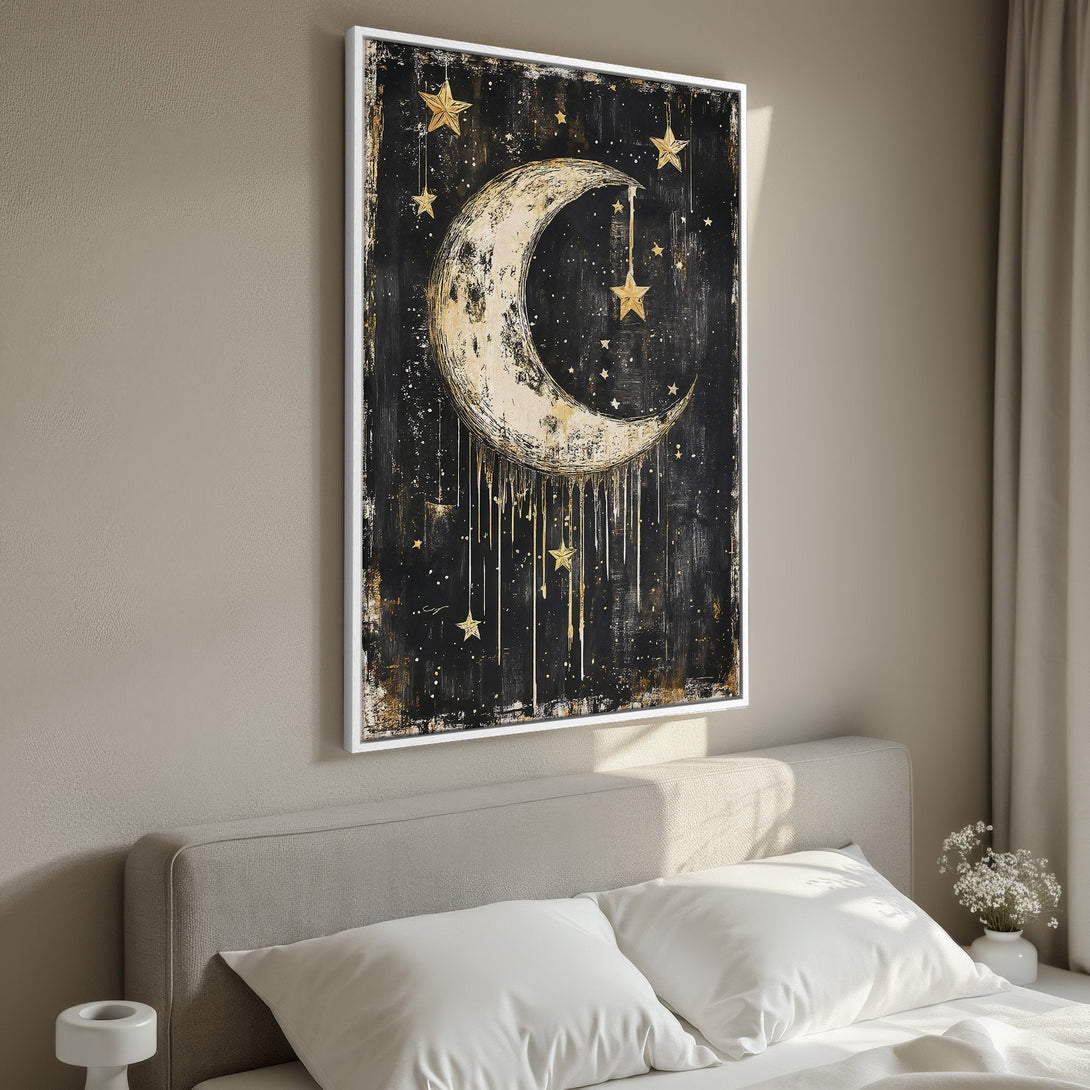Framed Wall Art featuring a dreamy moon and stars in black and gold. Perfect for adding celestial charm to your bedroom decor.