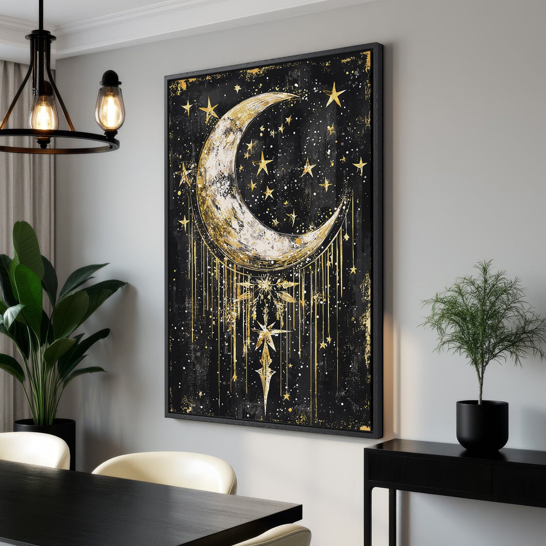 Framed Wall Art featuring a celestial moon and stars design in a black and gold color palette. Perfect for adding a touch of cosmic elegance to your space.