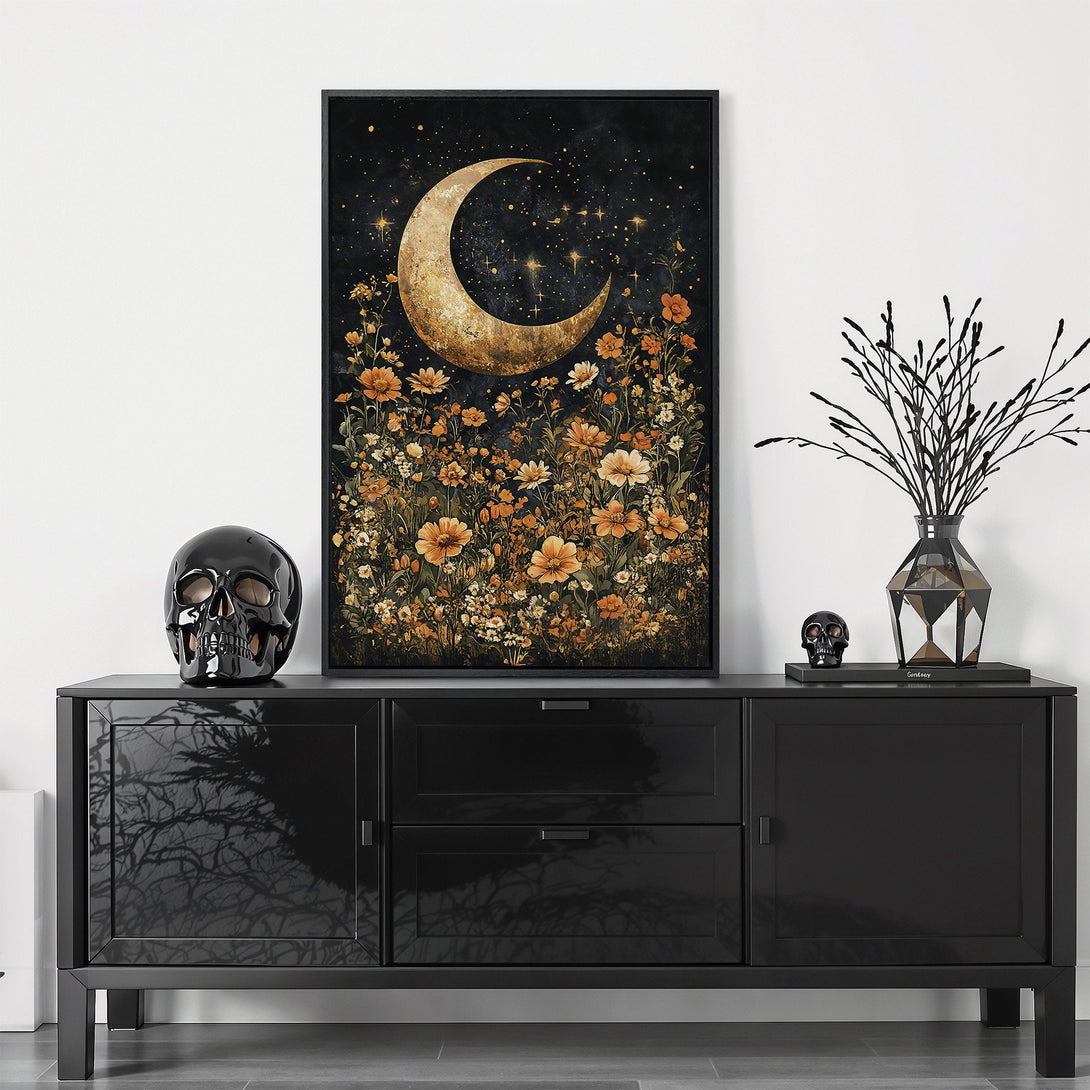 Framed Wall Art featuring a celestial moon and floral design in a moody, dark color palette. Perfect for adding a touch of boho style to your home decor.