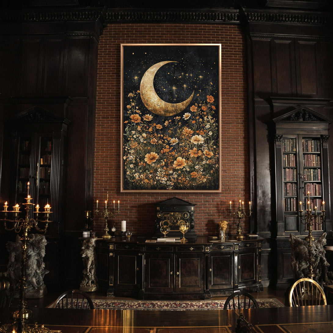 Framed Wall Art: Celestial moon and floral canvas print. Dark, moody interior with gold, black, and orange color palette. Perfect for adding a touch of elegance.