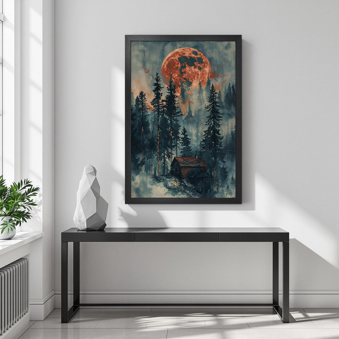 Framed Poster featuring a cabin in the woods with a fiery moon. Moody art print in teal and orange tones, perfect for home decor.