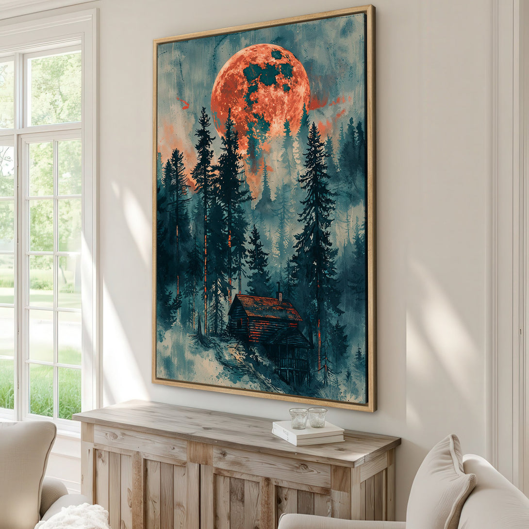 Framed Wall Art of a forest scene with a large orange moon. Moody, watercolor style with teal and orange tones. Perfect for adding a touch of nature.