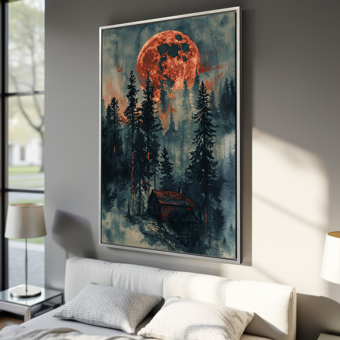 Framed Wall Art featuring a mystical forest scene with a large red moon. Moody watercolor style, blue and orange color palette. Perfect for adding character to your space.