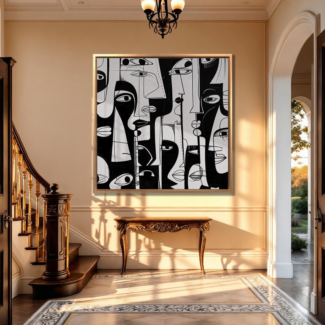 Framed Wall Art: Abstract faces in black & white, modern art canvas print. Interior design inspiration with neutral color palette and gold frame.