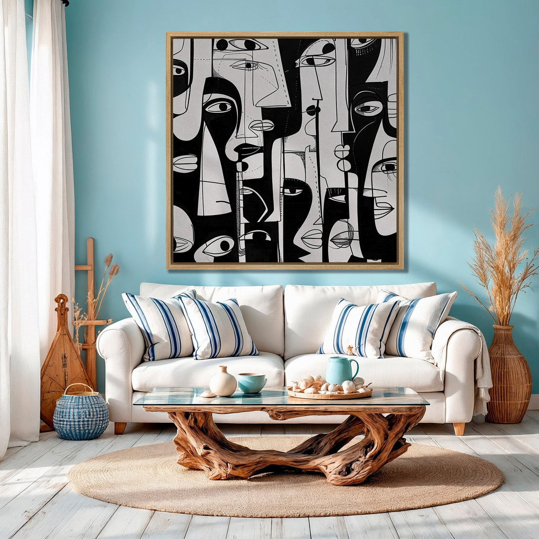 Framed Wall Art featuring abstract faces in black and white. Modern art Canvas Print adds a stylish touch to any interior, with a minimalist design and neutral color palette.