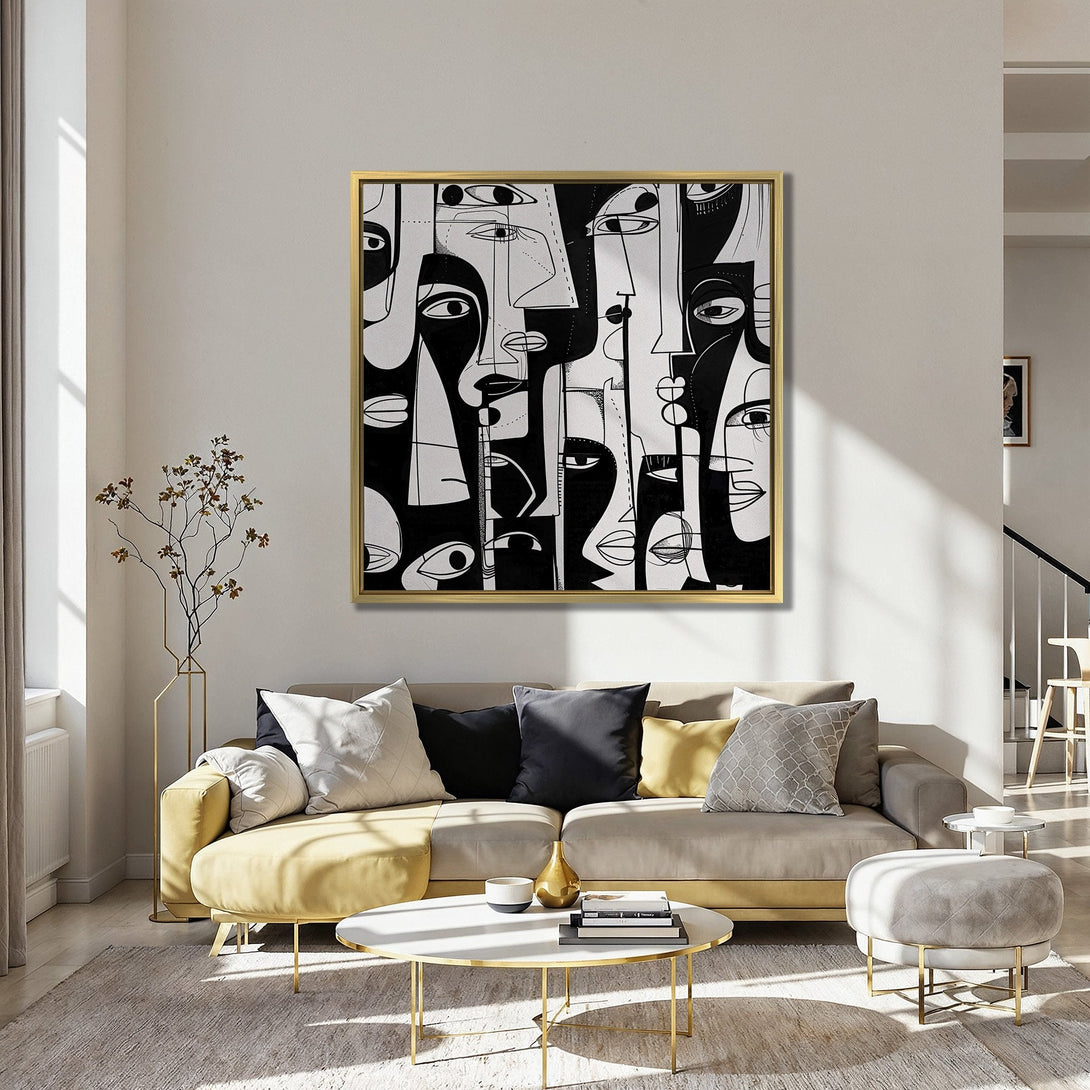 Canvas Print featuring abstract faces in black and white, displayed in a stylish interior with orange chairs and blue walls.