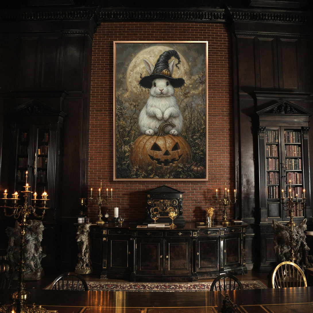 Framed Wall Art: Halloween-themed bunny wearing a witch hat on a pumpkin, displayed in a dark interior. Warm, earthy tones and a touch of spooky charm.