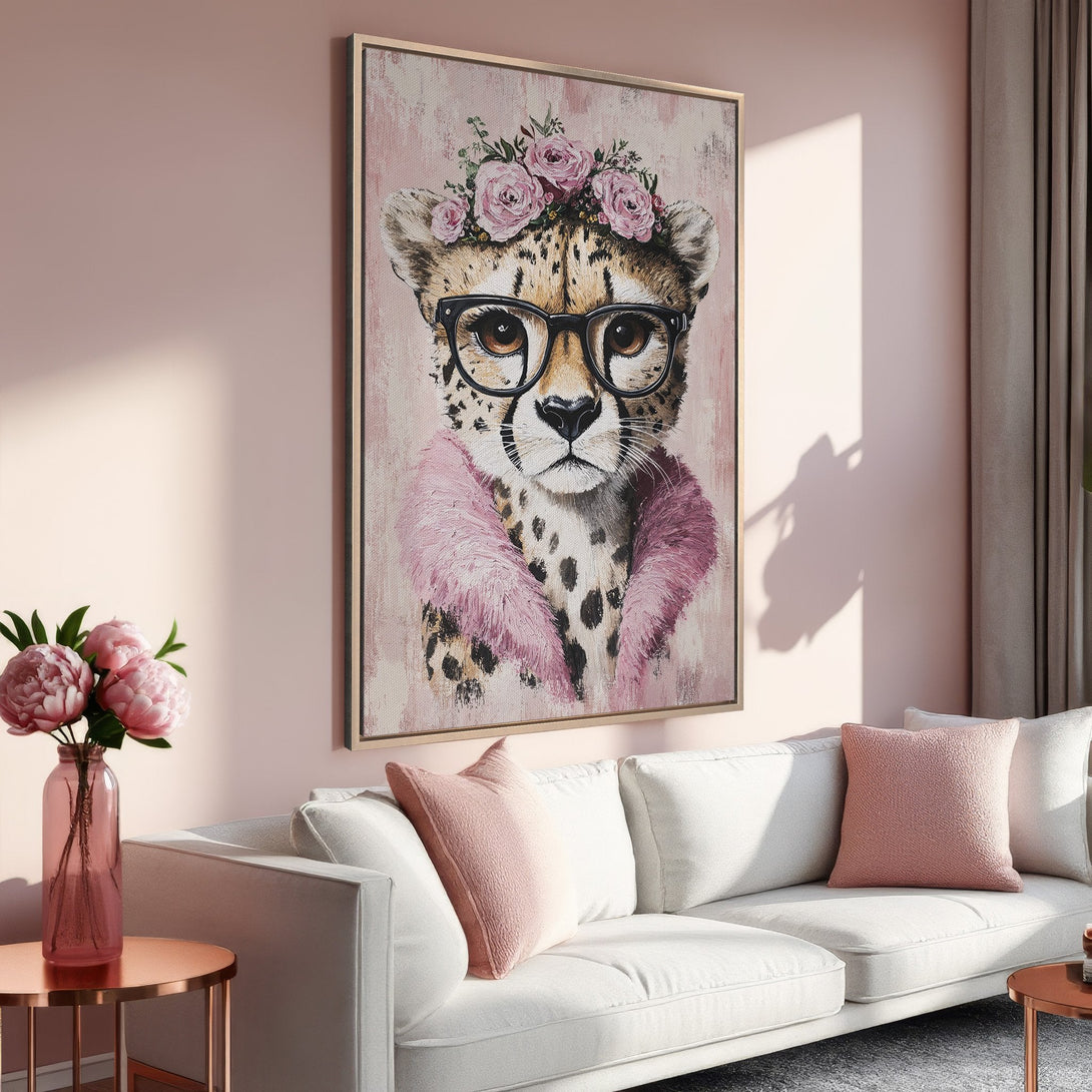 Framed Wall Art of a fashionable cheetah in pink hues. A chic and stylish canvas print to elevate any space with a touch of whimsy.