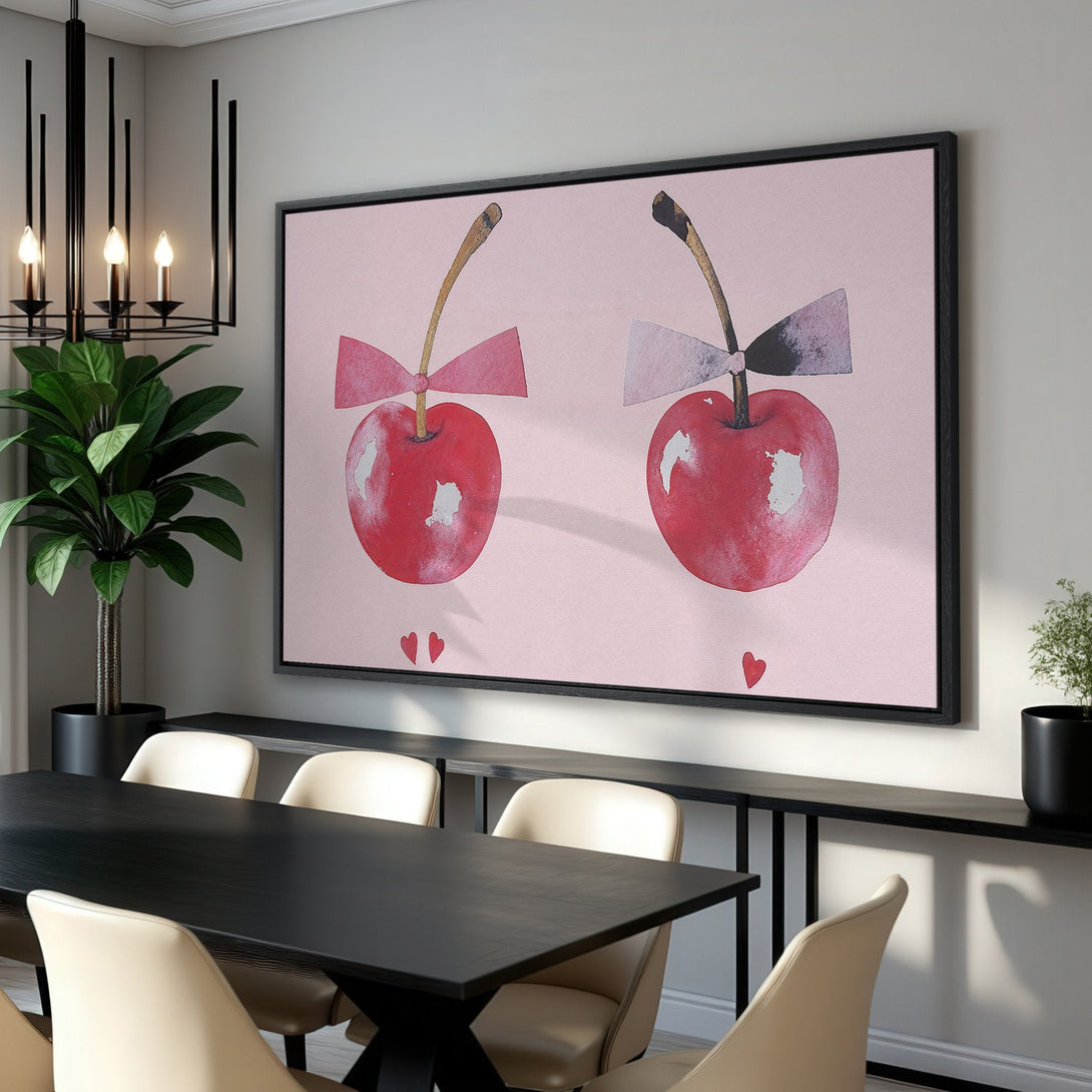 Framed Wall Art featuring watercolor cherries with bows in a pink and red color palette. Perfect for adding a touch of whimsy to your home decor.