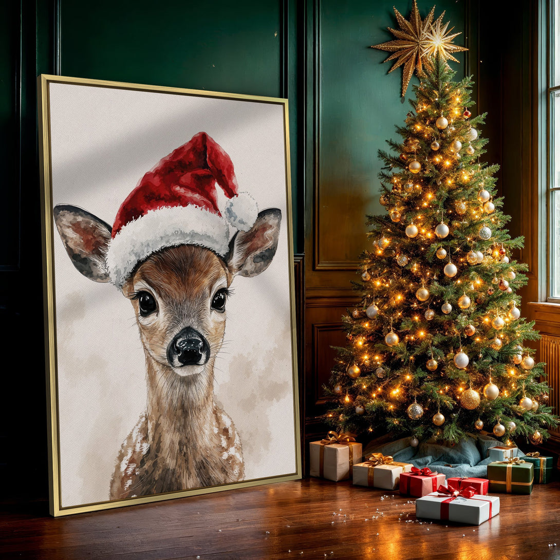 Canvas Print of a watercolor deer wearing a Santa hat. Warm, neutral tones with pops of red. Perfect Christmas wall art.