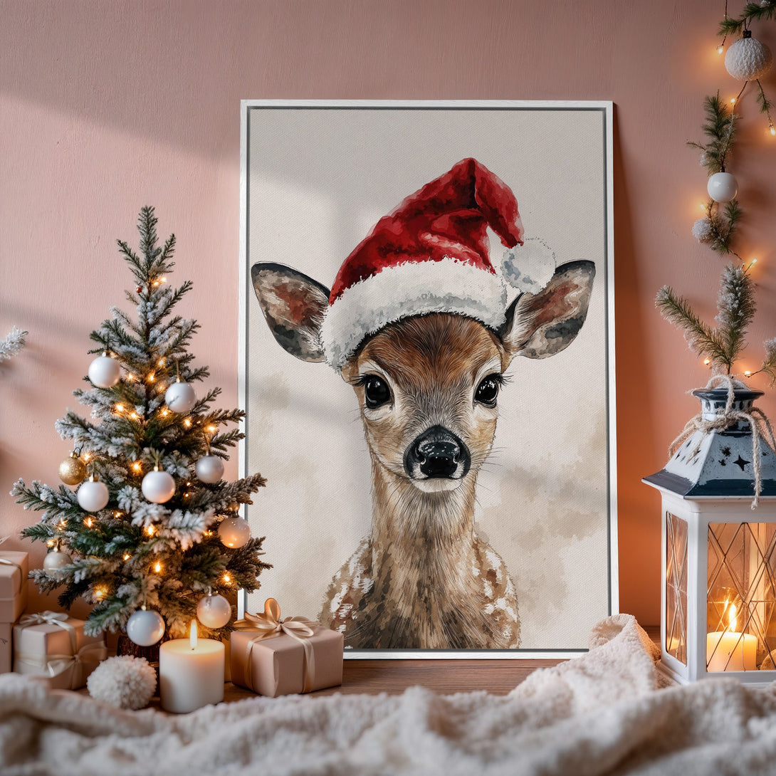 Framed Wall Art: Watercolor painting of a deer in a Santa hat. Warm, neutral color palette. Perfect Christmas decor for your home.