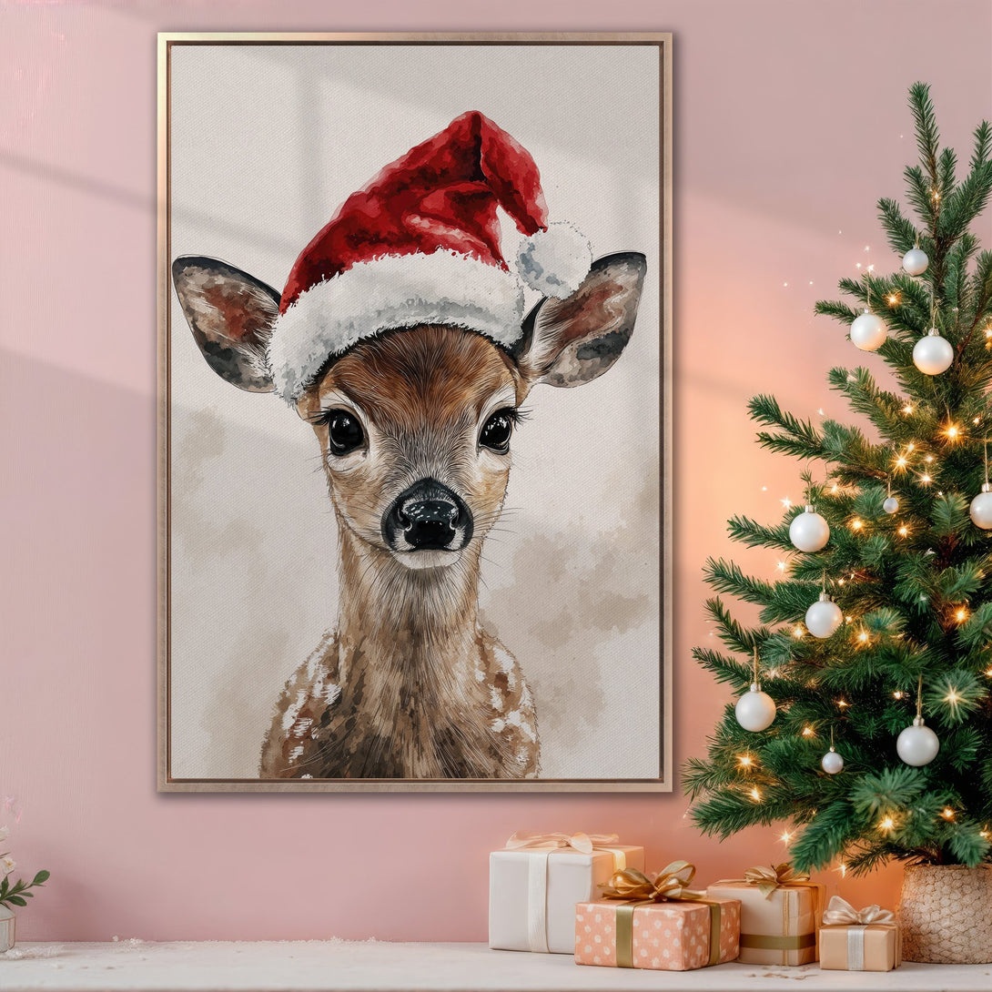 Framed Wall Art featuring a watercolor deer in a Santa hat. Warm, inviting color palette perfect for Christmas decor. Add festive charm to your home!