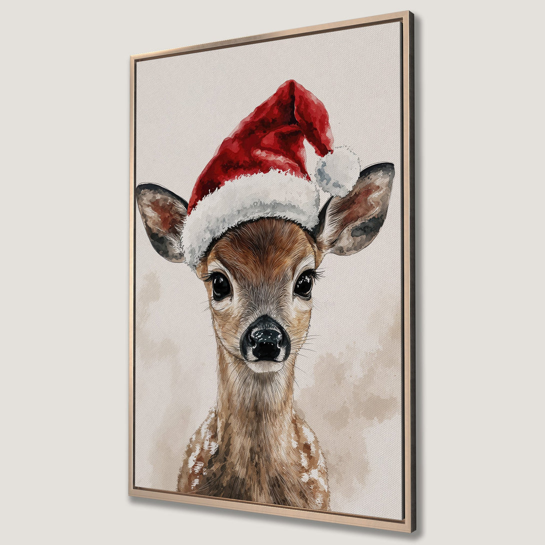 Framed Wall Art featuring a charming watercolor fawn wearing a Santa hat. Neutral tones with pops of red, perfect for Christmas decor. Add holiday cheer to your home!