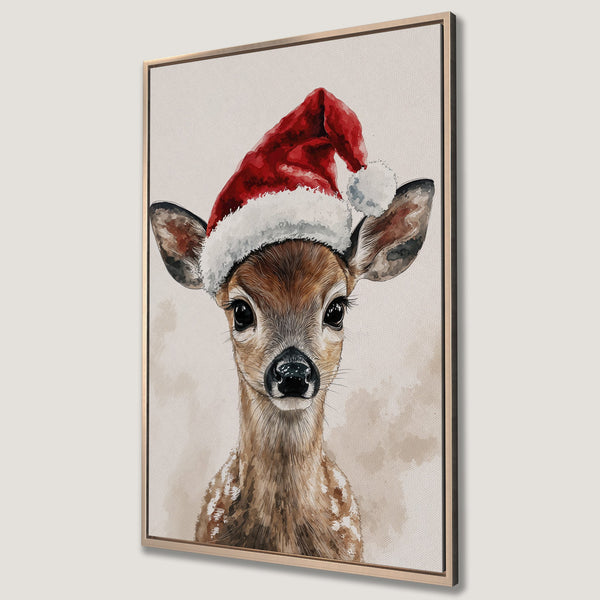 Framed Wall Art featuring a charming watercolor fawn wearing a Santa hat. Neutral tones with pops of red, perfect for Christmas decor. Add holiday cheer to your home!