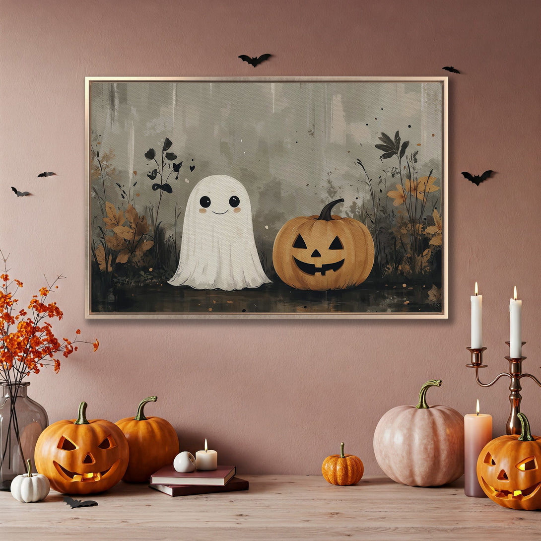 Framed Wall Art: Adorable Halloween ghost and pumpkin art in a muted color palette. Perfect spooky season decor for your home!