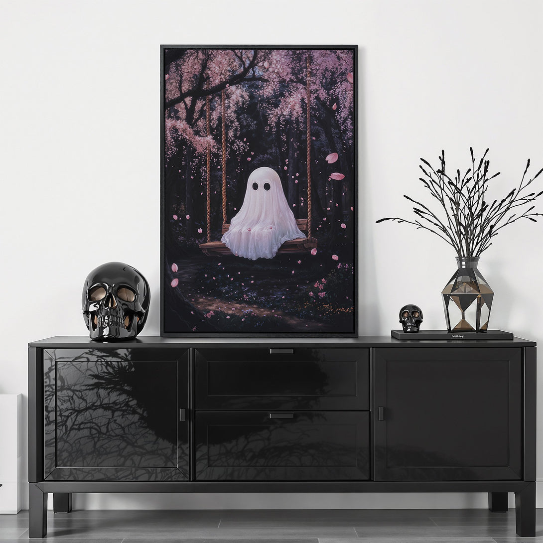 Framed Wall Art featuring a whimsical ghost on a swing in a dark forest, with a pink and black color palette. Perfect for adding a touch of spooky charm.