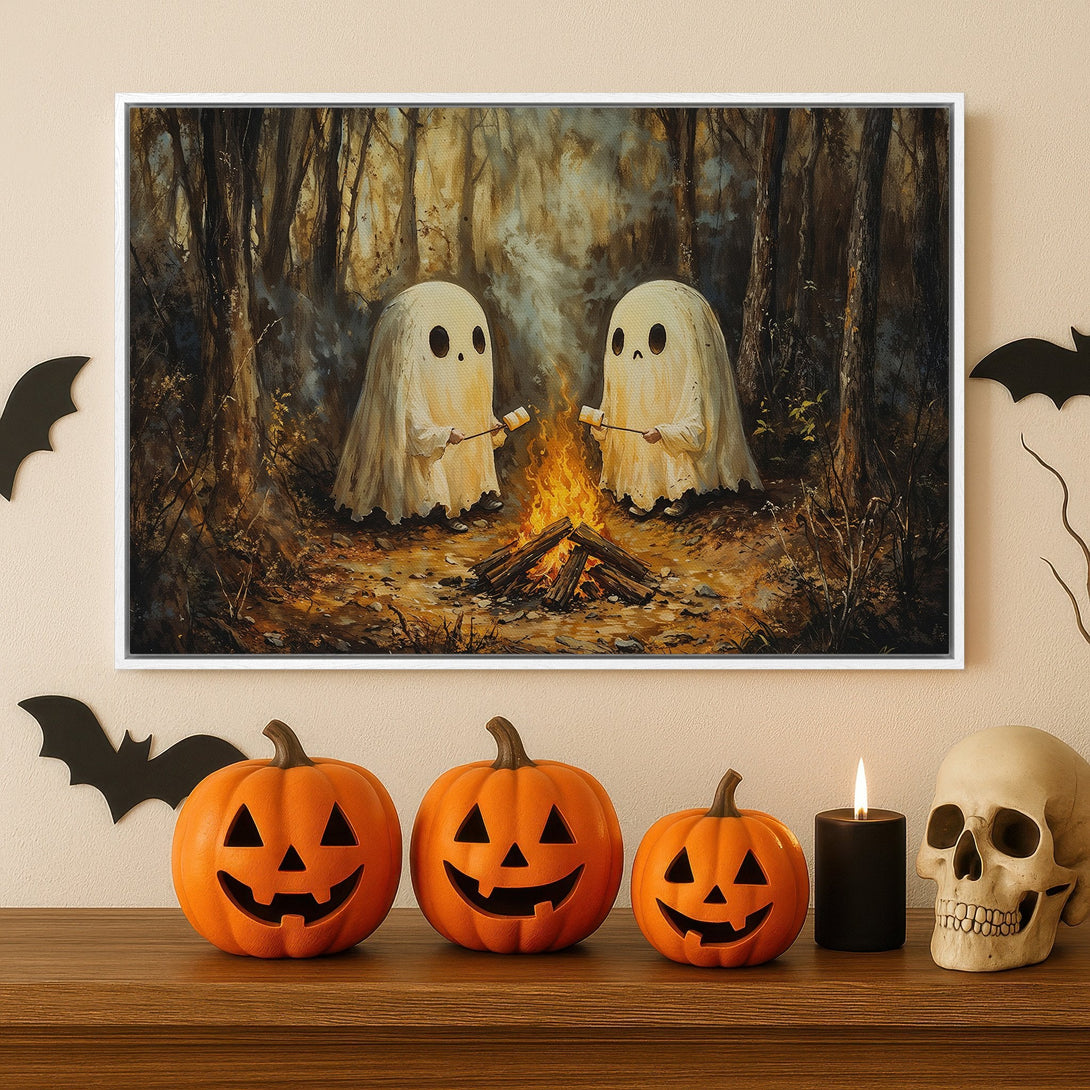 Framed Wall Art: Spooky Halloween canvas print featuring ghosts roasting marshmallows by a campfire in a forest. Warm, earthy tones perfect for fall decor.