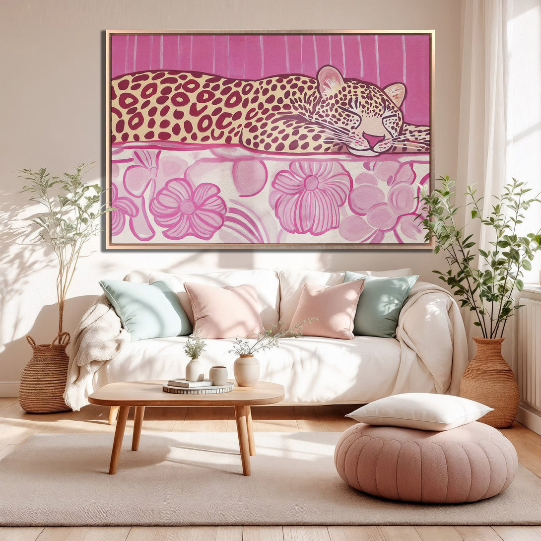 Framed Wall Art featuring a leopard in a pink and cream color palette. Modern art to elevate your living room decor.
