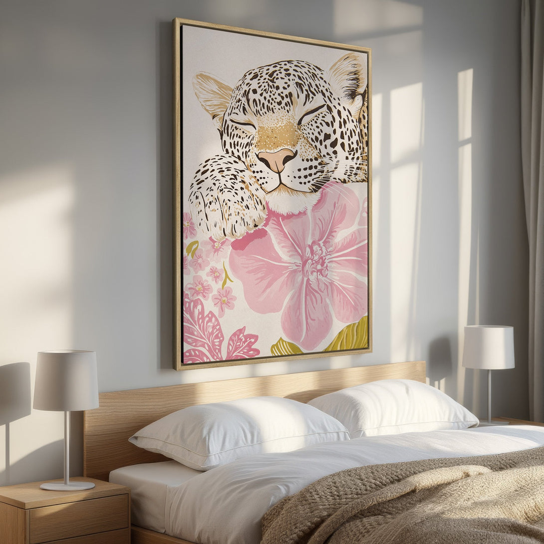 Framed Wall Art: Leopard print canvas with pink floral accents. Modern, stylish bedroom decor with a neutral and pink color palette.