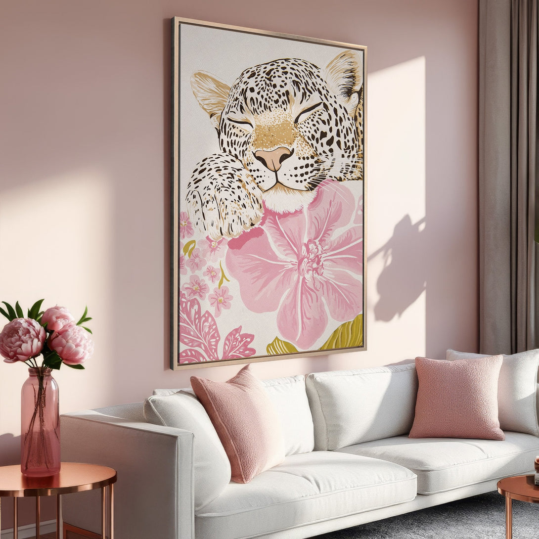 Framed Wall Art: Leopard print canvas in a pink and gold color palette. Perfect for adding a touch of elegance to your living room. Shop now!