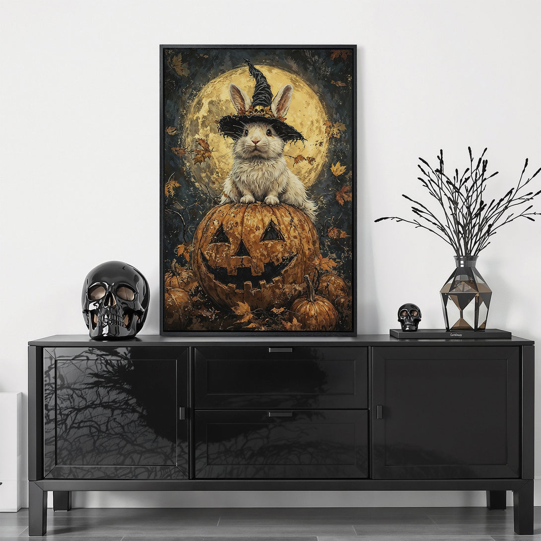 Framed Wall Art: Whimsical Halloween rabbit in witch hat on pumpkin, warm autumn tones. Perfect spooky decor for your home!