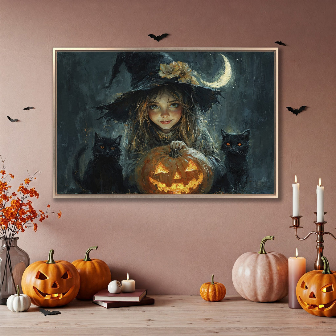 Framed Wall Art: Spooky Halloween witch with black cats & pumpkin. Dark, moody color palette. Perfect fall decor!