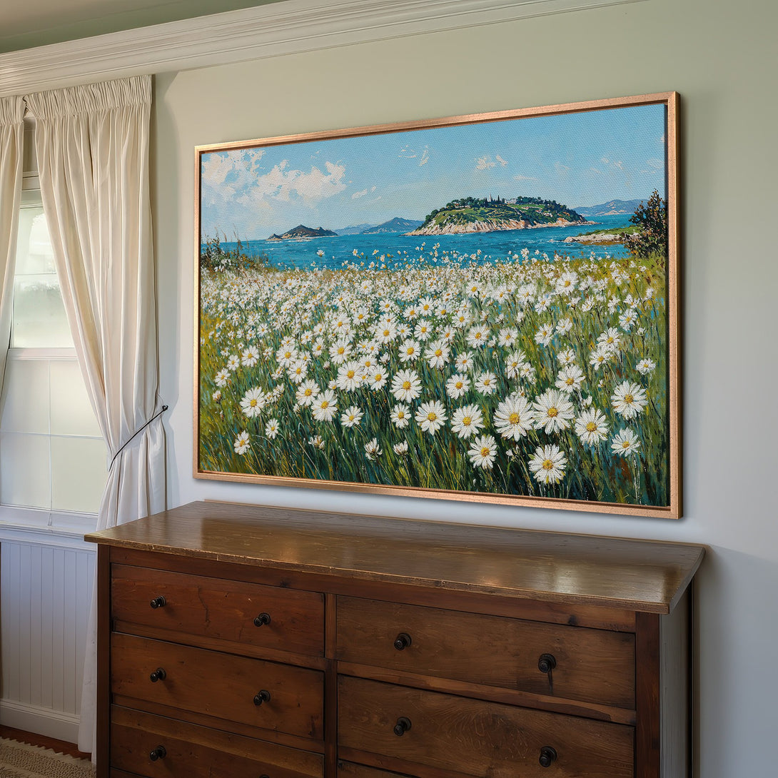 Framed Wall Art: Coastal landscape Canvas Print in blue and white, featuring daisies and sea. Perfect for adding a touch of nature to your home decor.